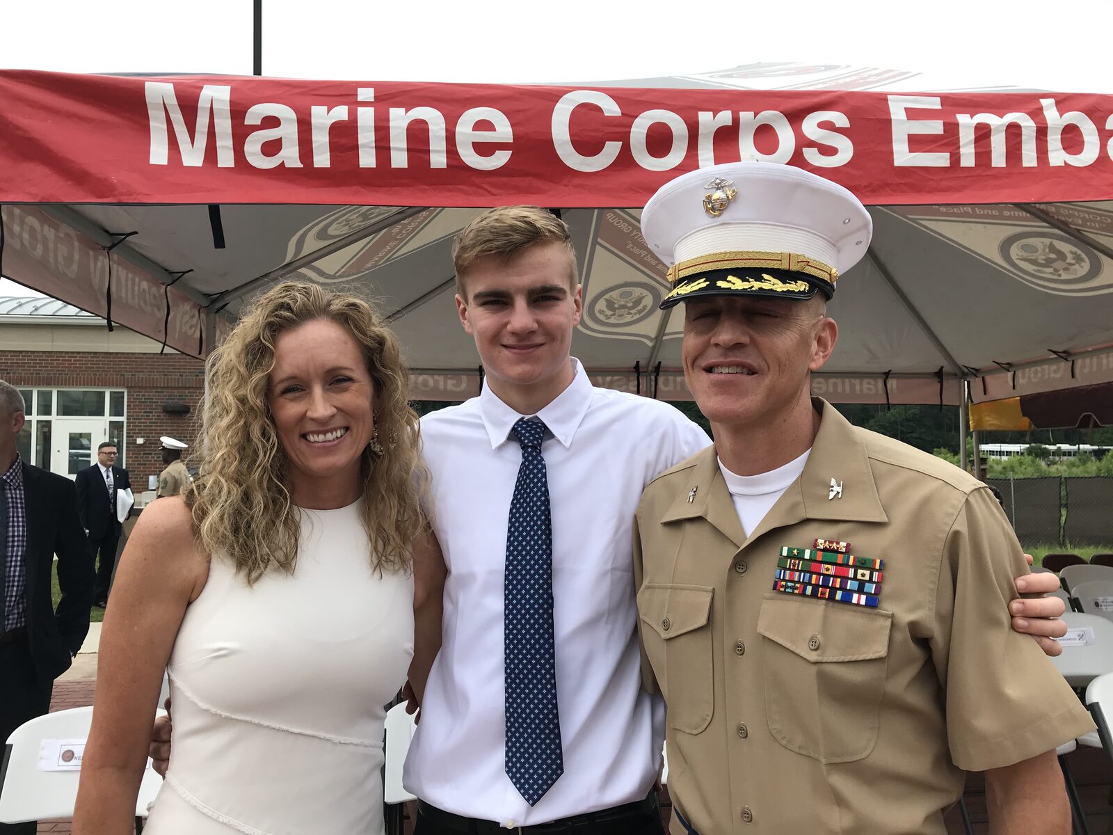 Jennifer with her family at a Marine Corps Embassy Security Group ceremony